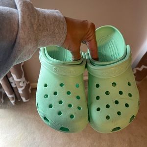 Youth size 5 Crocs- like new. It’s like a bright mint color.